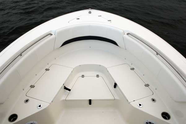 The definition of an outboard motor is a detachable engine mounted on outboard brackets on the stern of your boat.  This configuration will have only one single engine.
