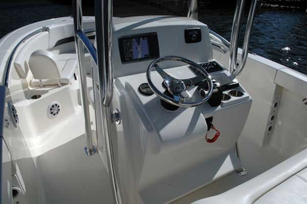 The definition of an outboard motor is a detachable engine mounted on outboard brackets on the stern of your boat.  This configuration will have only one single engine.