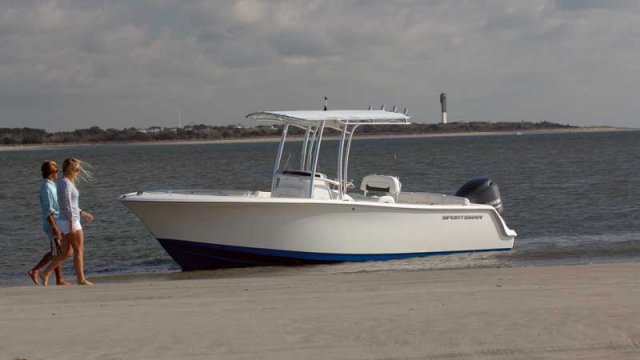 Glass fibers either loose or woven, reinforced with resin and used in the construction of many boats.