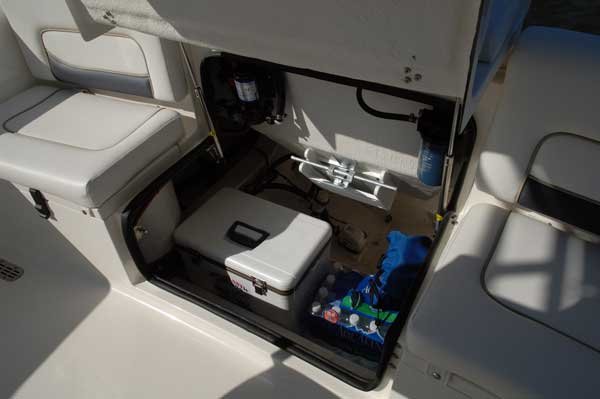 Glass fibers either loose or woven, reinforced with resin and used in the construction of many boats.